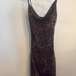 slip midi dress in leopard print with a cowl neck.